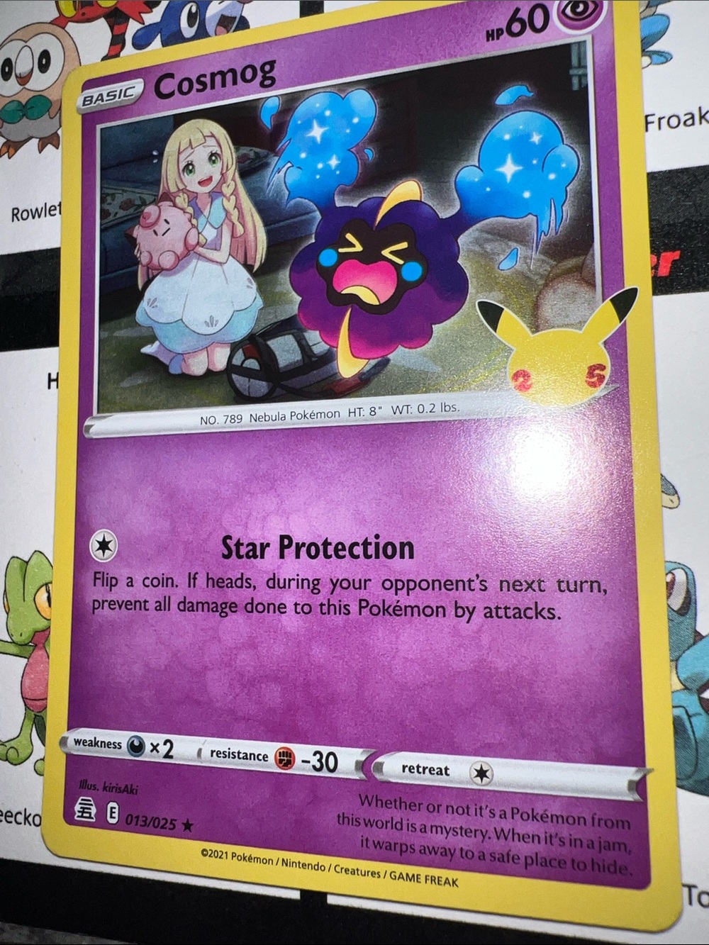 Pokemon Cosmog Trading Card - Purple, Yellow, Blue